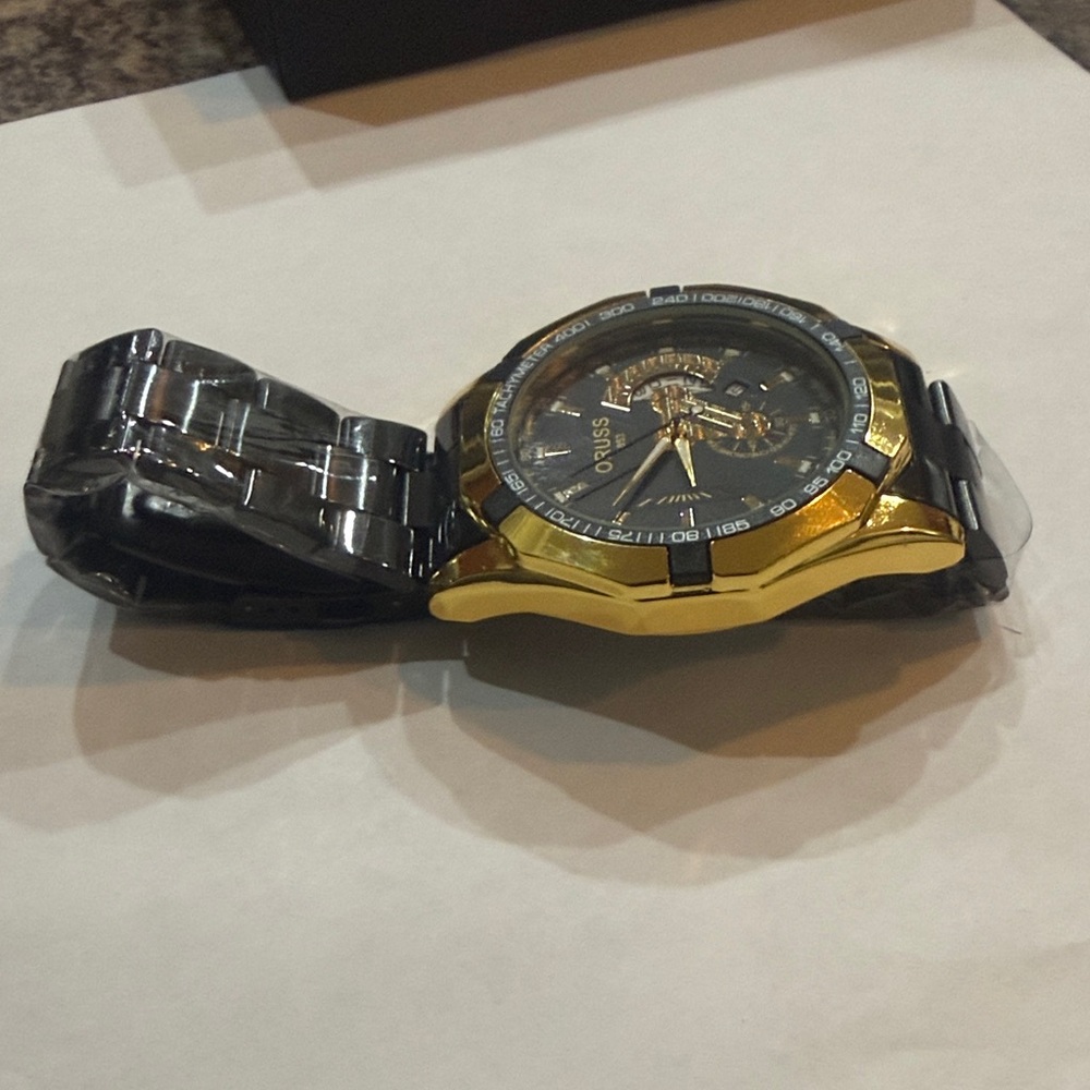#68 Gold and Black ORUSS Watch with elegant style. - Picture 3 of 8
